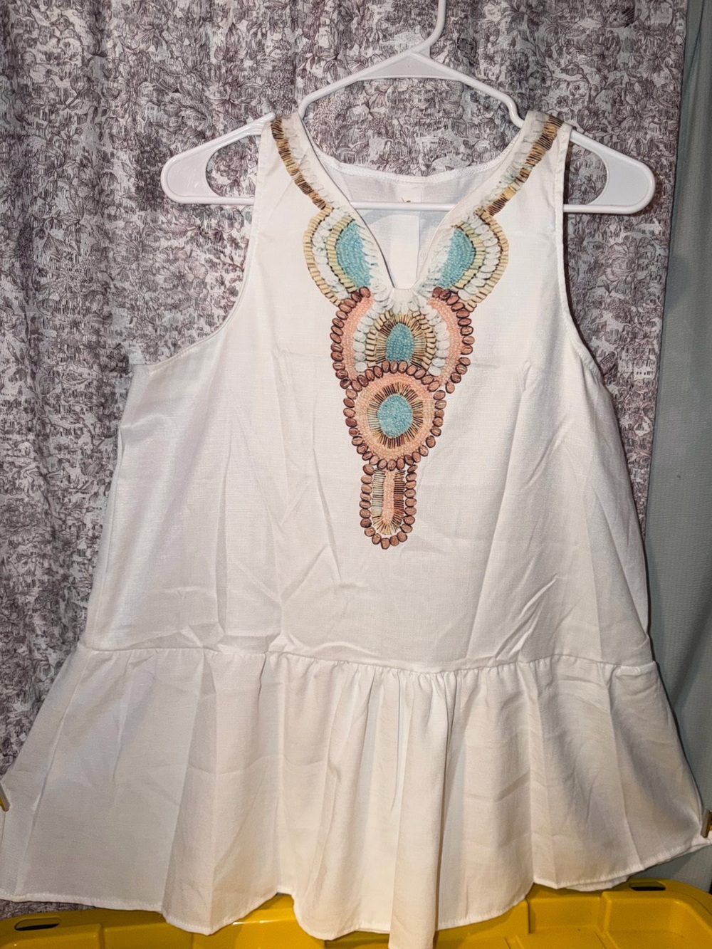 White Embroidered Sleeveless Peplum Dress